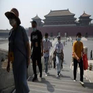 في #بكين ارتداء الكمامات بالأماكن المفتوحة لم يعد إجبارياً
