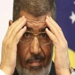 محام عن مرسي يصف محاكمة المعزول بأنها "غير دستورية"